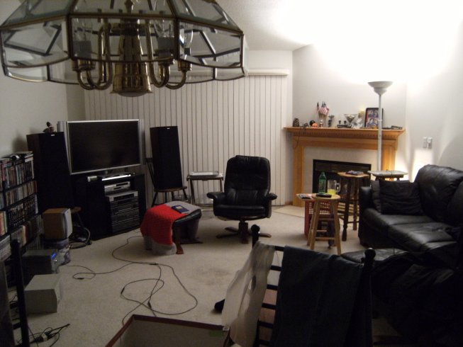 [Inside a nice cozy livingroom with a fireplace.]